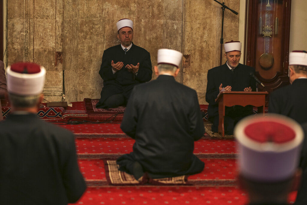 APTOPIX Virus Outbreak Kosovo Eid